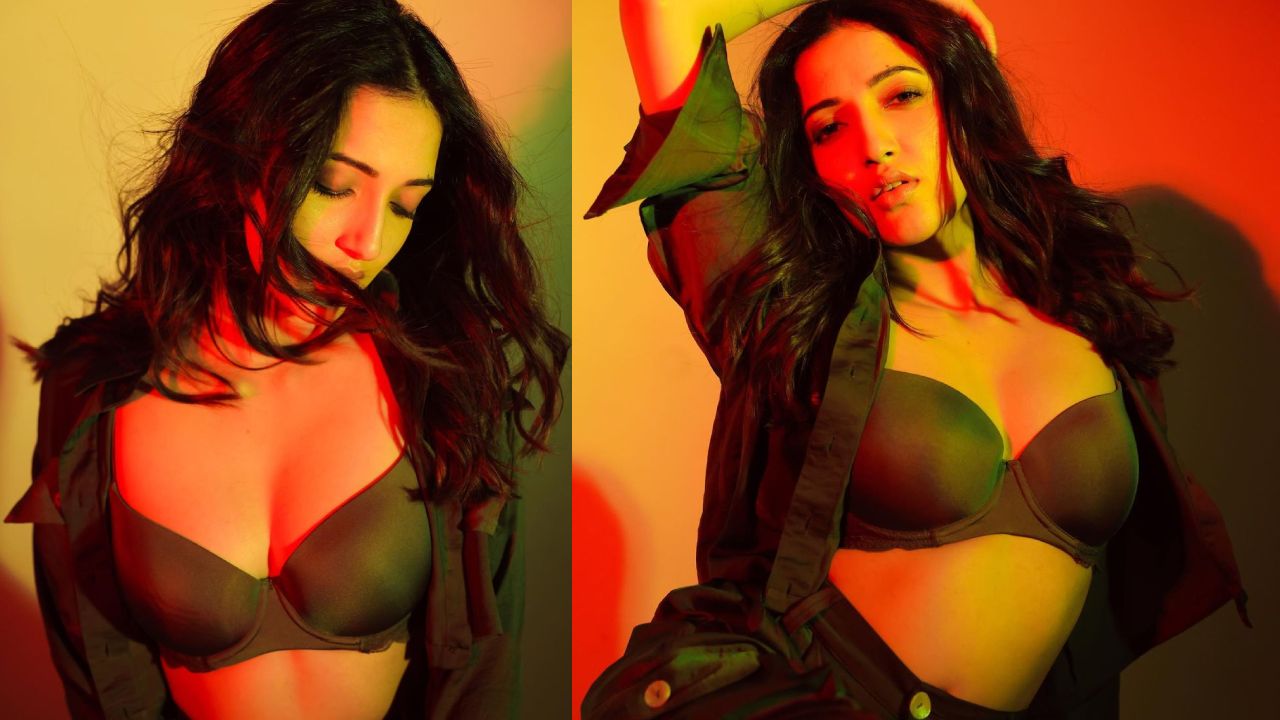 Neha Shetty : షర్ట్ ఓపెన్ చేసి ఎద భాగం చూపిస్తూ రెచ్చిపోయిన డీజేటిల్లు భామ..