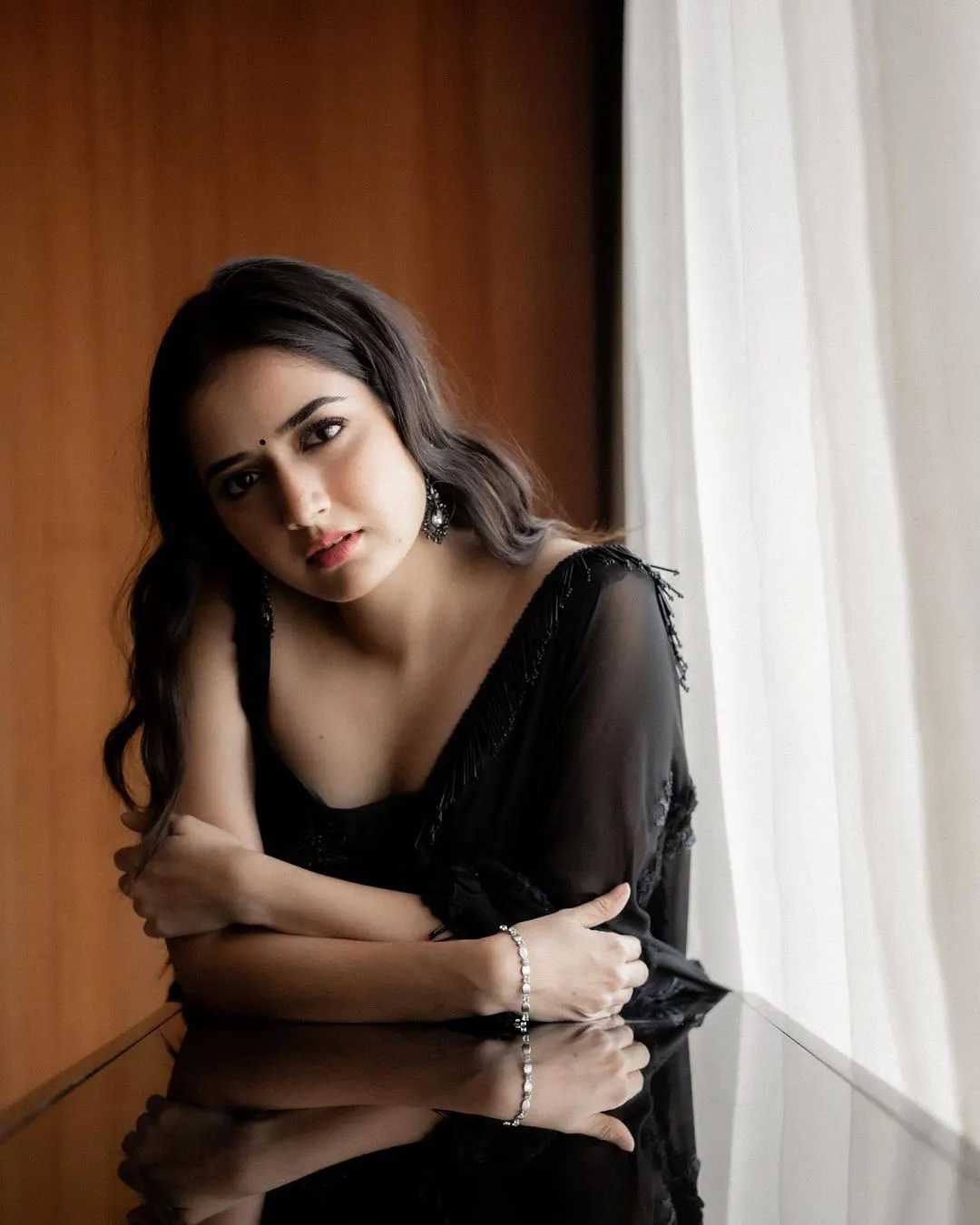 Aashika Ranganath dazzling photoshoot in a black saree
