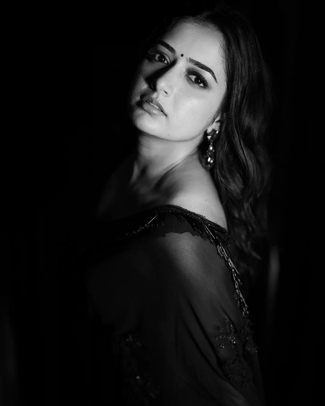 Aashika Ranganath dazzling photoshoot in a black saree