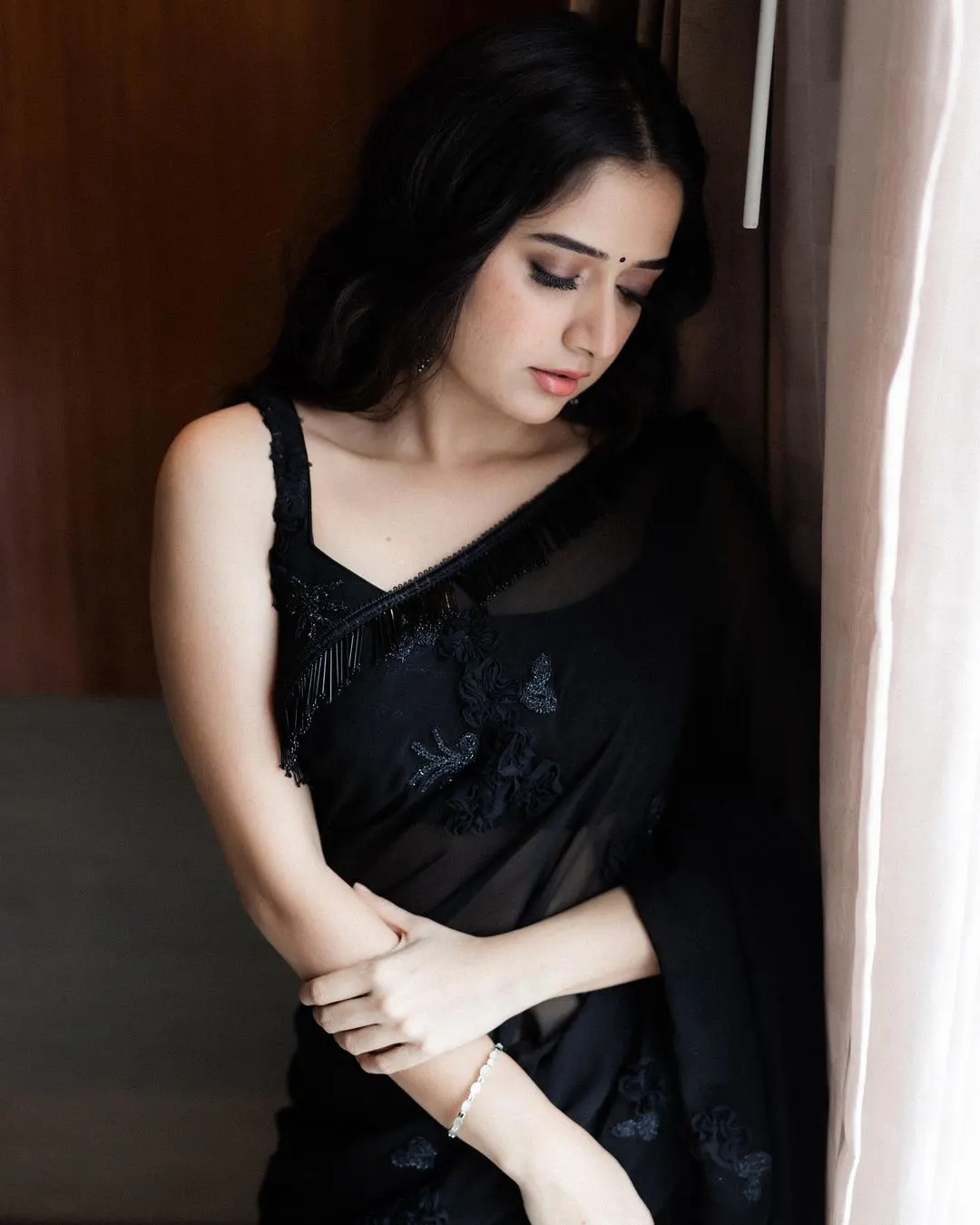 Aashika Ranganath dazzling photoshoot in a black saree