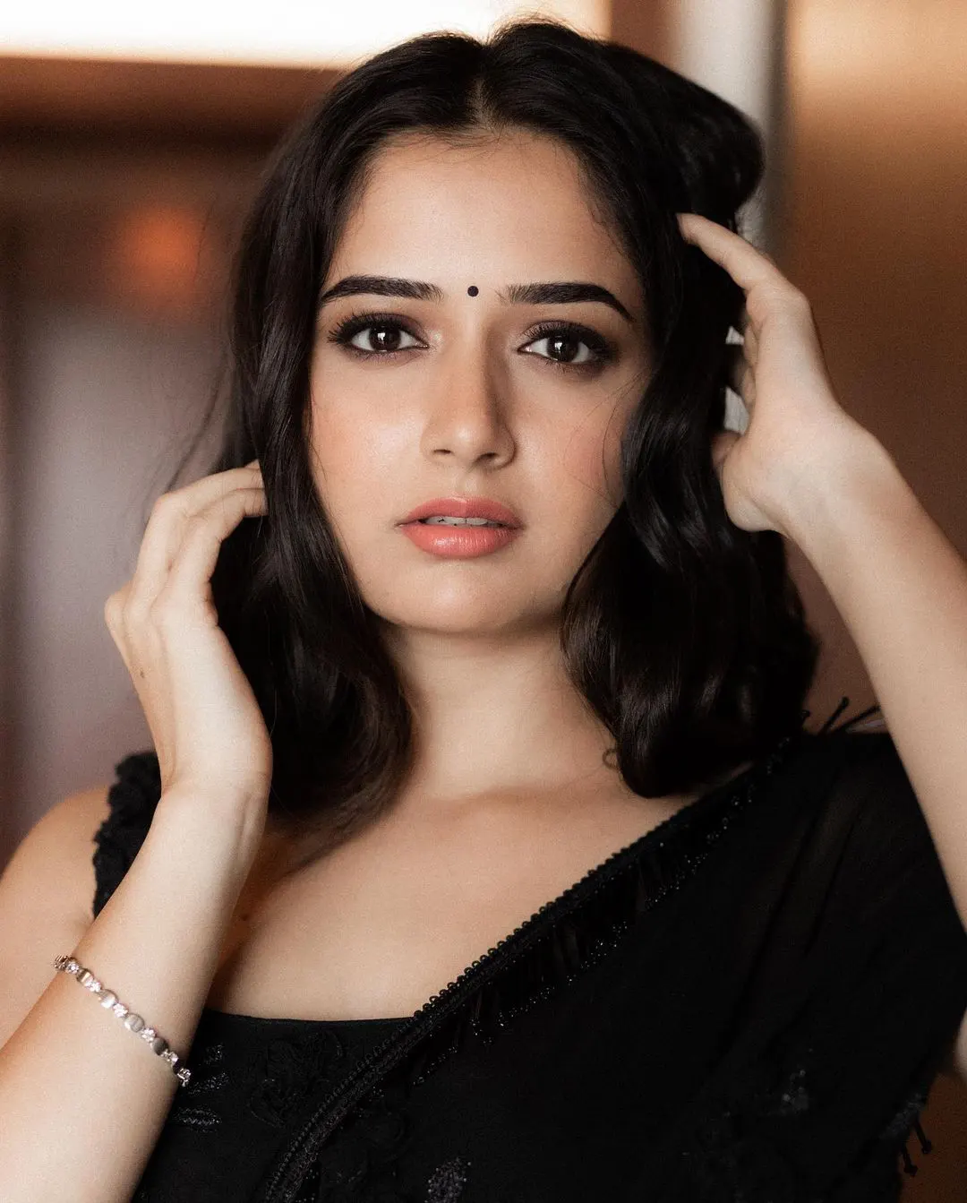 Aashika Ranganath dazzling photoshoot in a black saree