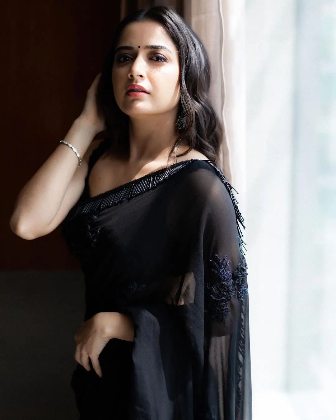 Aashika Ranganath dazzling photoshoot in a black saree