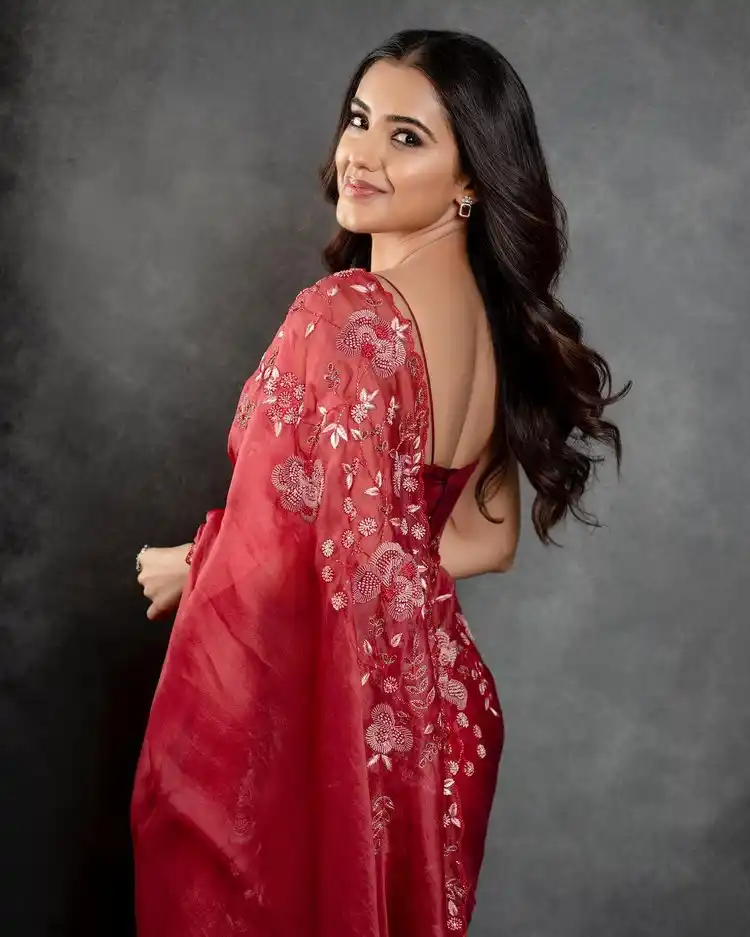 Malvika Sharma Sizzles In Red Saree
