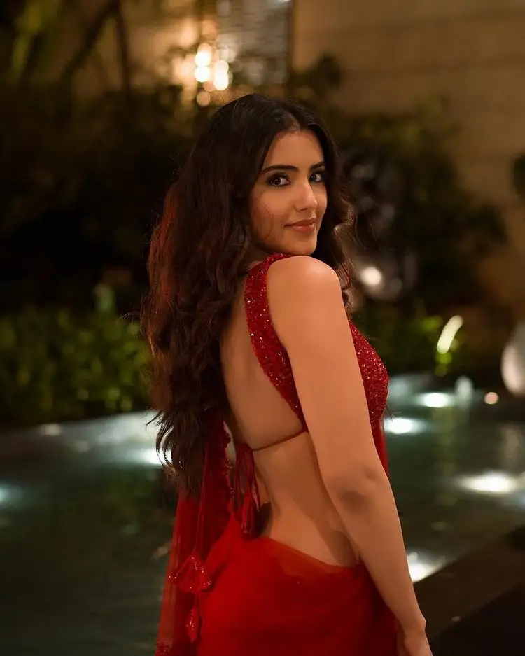 Malvika Sharma Sizzles In Red Saree