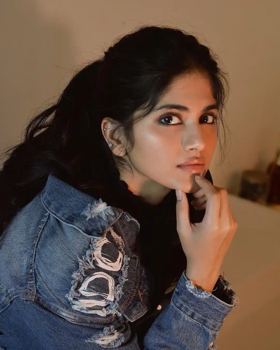 Megha Akash poses in jeans wear