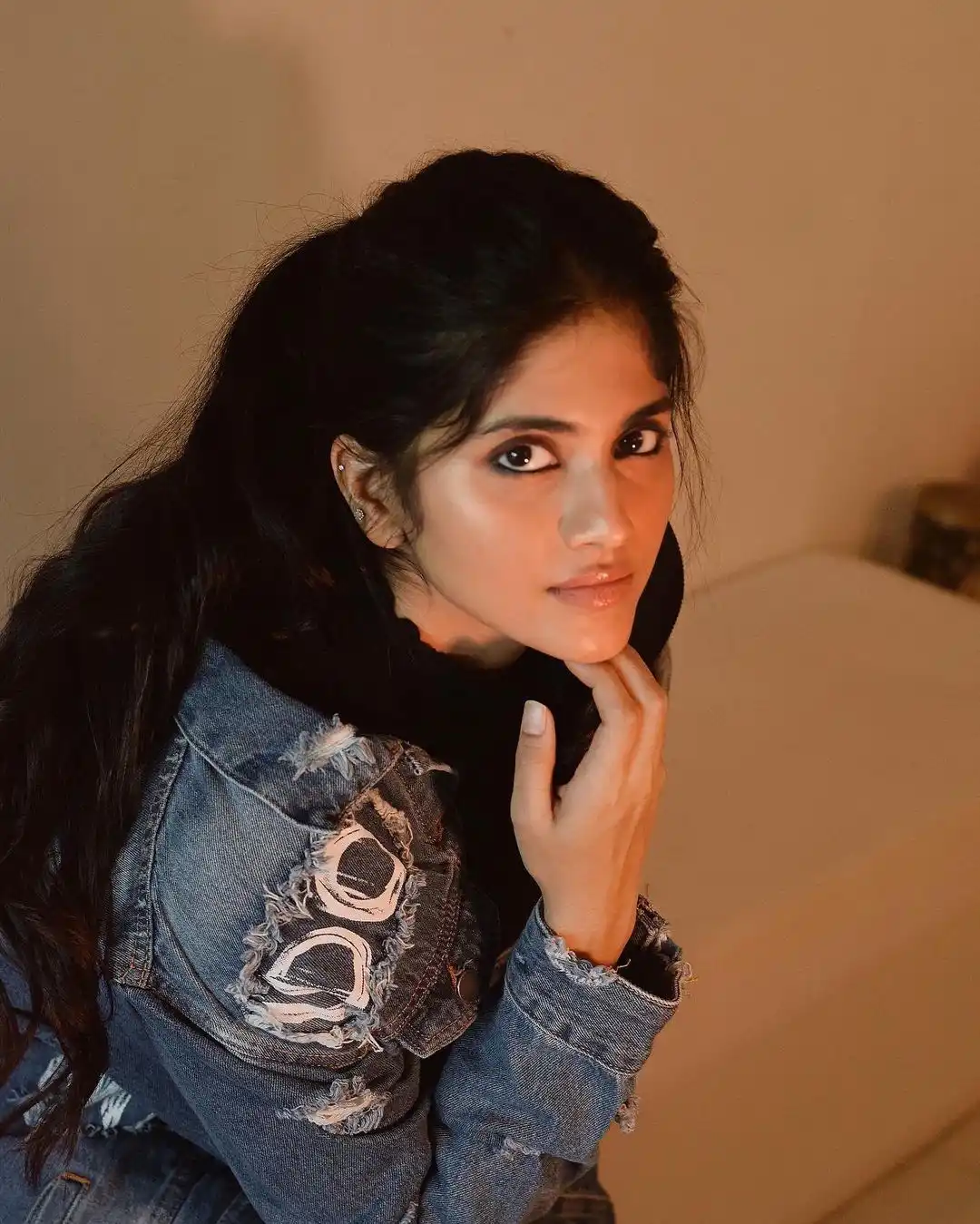 Megha Akash poses in jeans wear