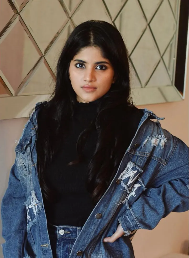 Megha Akash poses in jeans wear