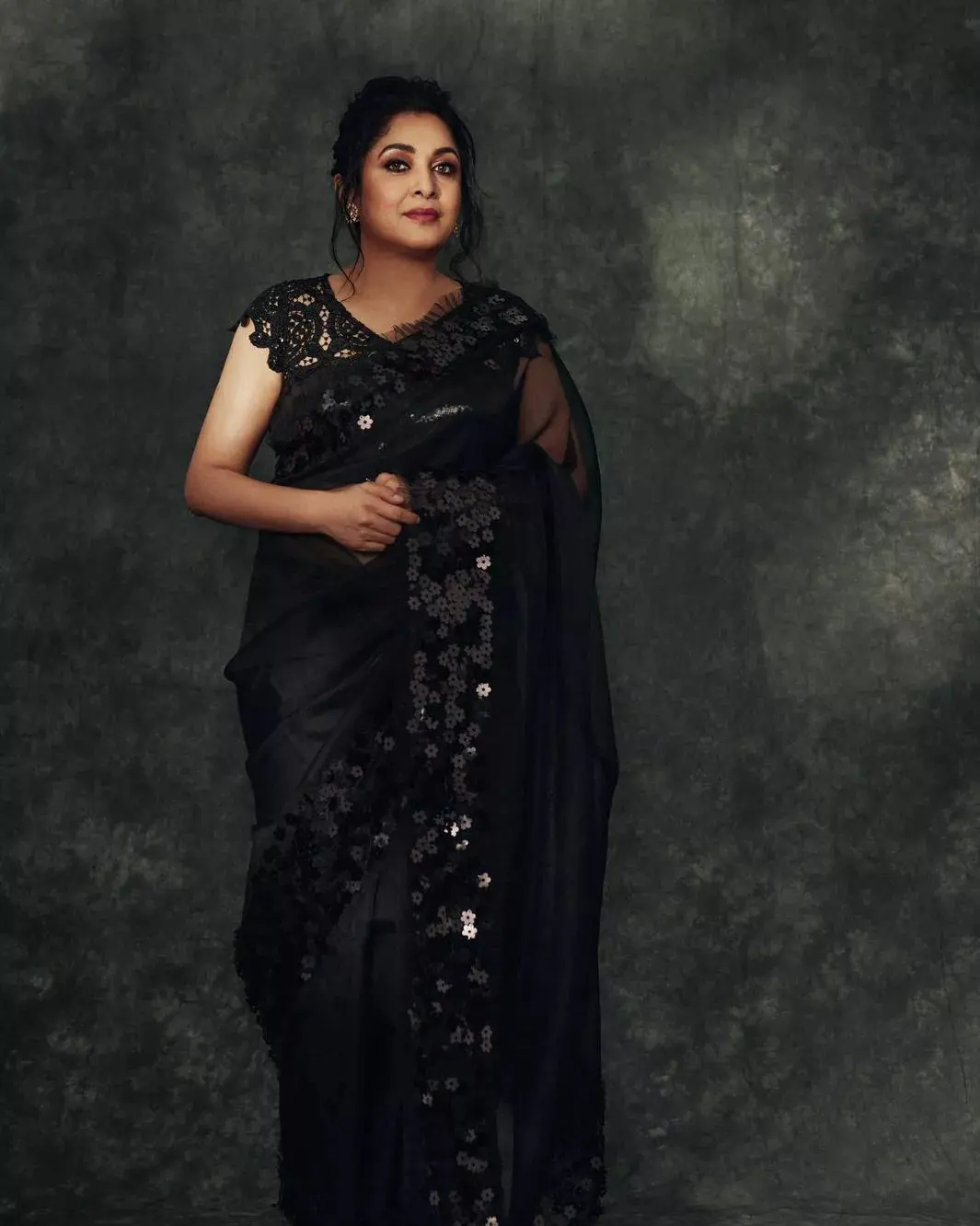 Ramyakrishna looks more beautiful in black saree at the age of 52