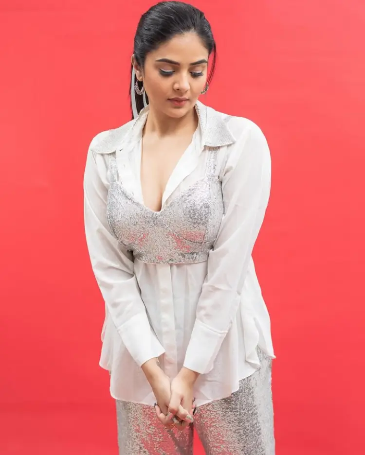 Sreemukhi Sizzles In White Outfit