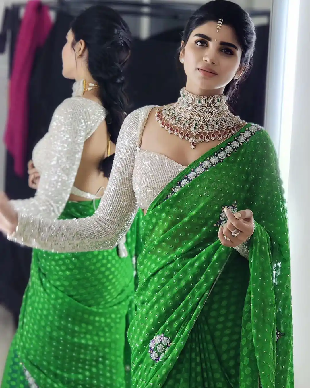 Varsha is sparkling with a necklace around her neck