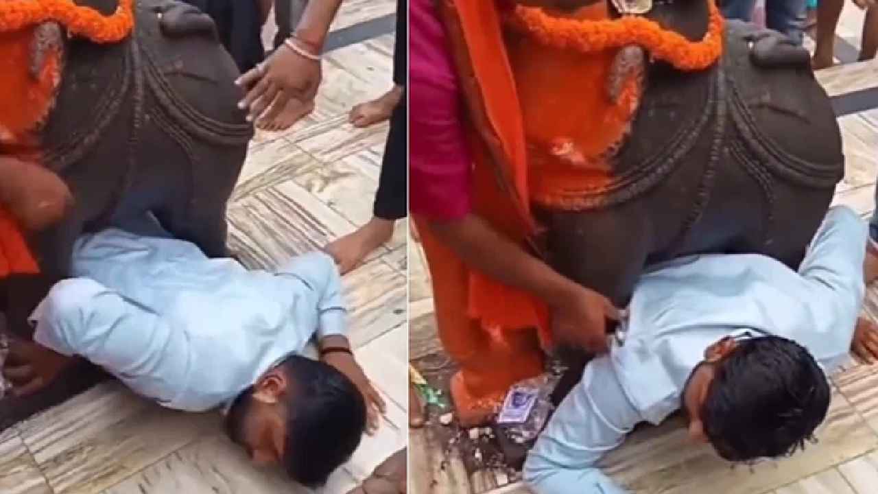 Devotee Stuck Under Statue : అయ్యో భయ్యా.. అక్కడేం పని నీకు.. గుడిలో విగ్రహం కిందకి వెళ్లి ఇరుక్కుపోయిన భక్తుడు.. వీడియో వైరల్ Devotee Stuck Under Statue : అయ్యో భయ్యా.. అక్కడేం పని నీకు.. గుడిలో విగ్రహం కిందకి వెళ్లి ఇరుక్కుపోయిన భక్తుడు.. వీడియో వైరల్