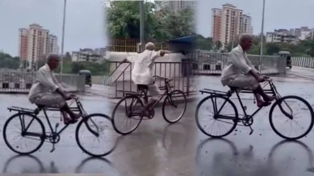 Elderly man performs stunts on his bicycle