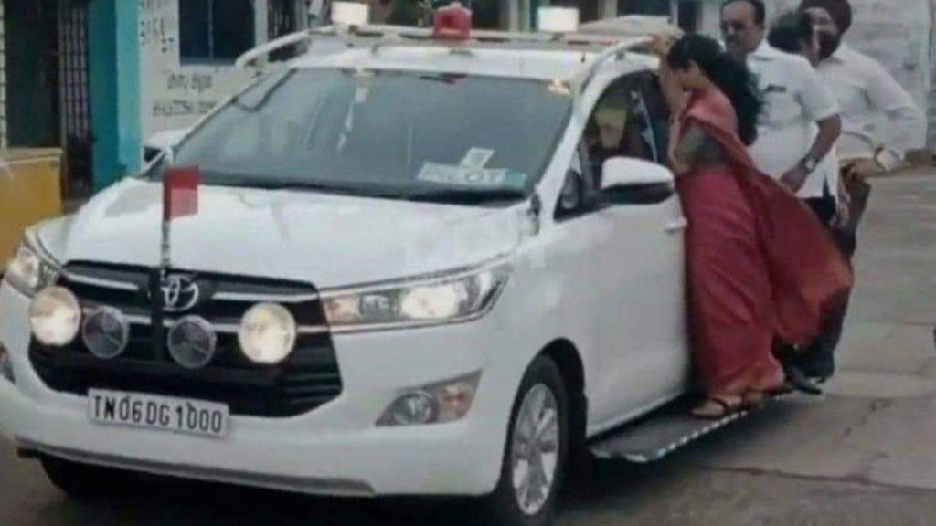 Chennai mayor Priya traveling hanging from CM Stalin car