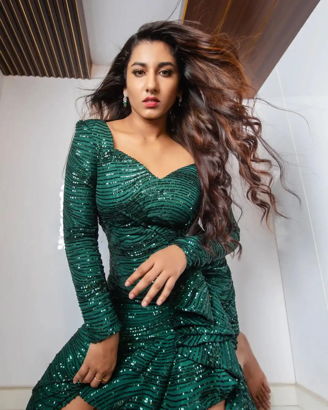 Vishnupriya veraity Poses in Short Green Dress