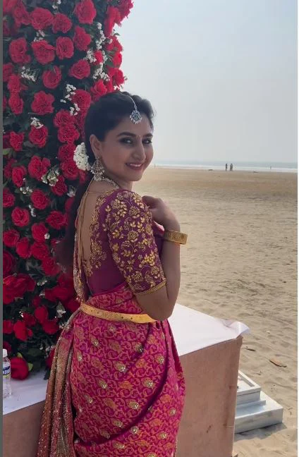 Anchor Varshini Special Photos in Wedding Saree at Goa Beach 