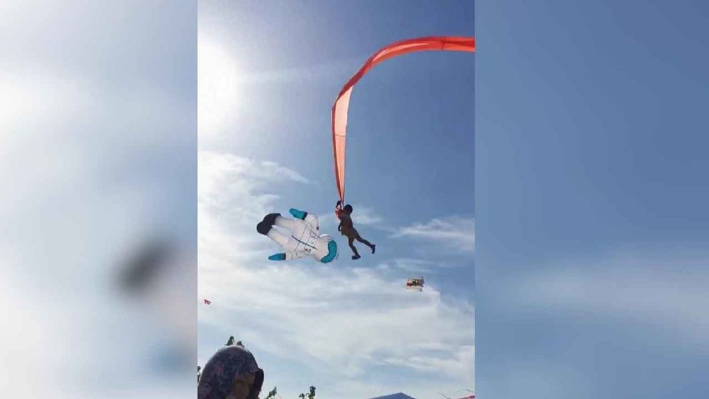 Girl Flying By Kite