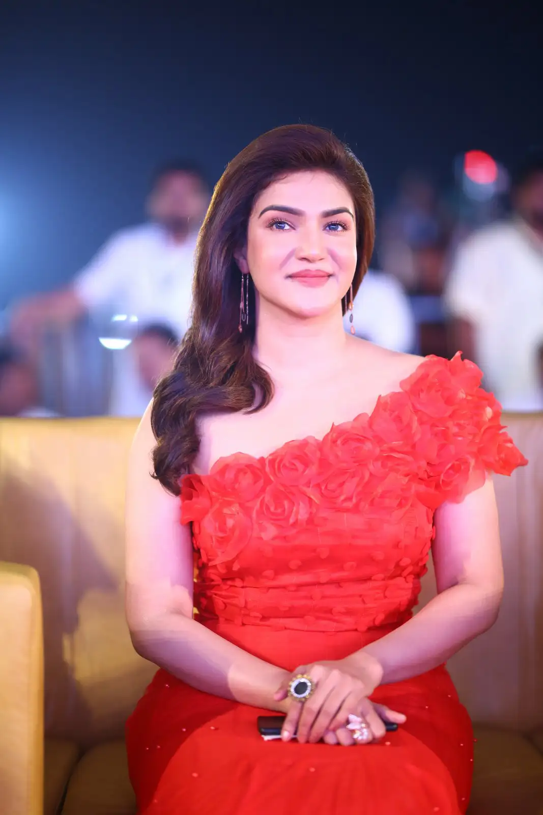 Honey Rose shines with Red Dress in Veerasimha Reddy Pre Release Event
