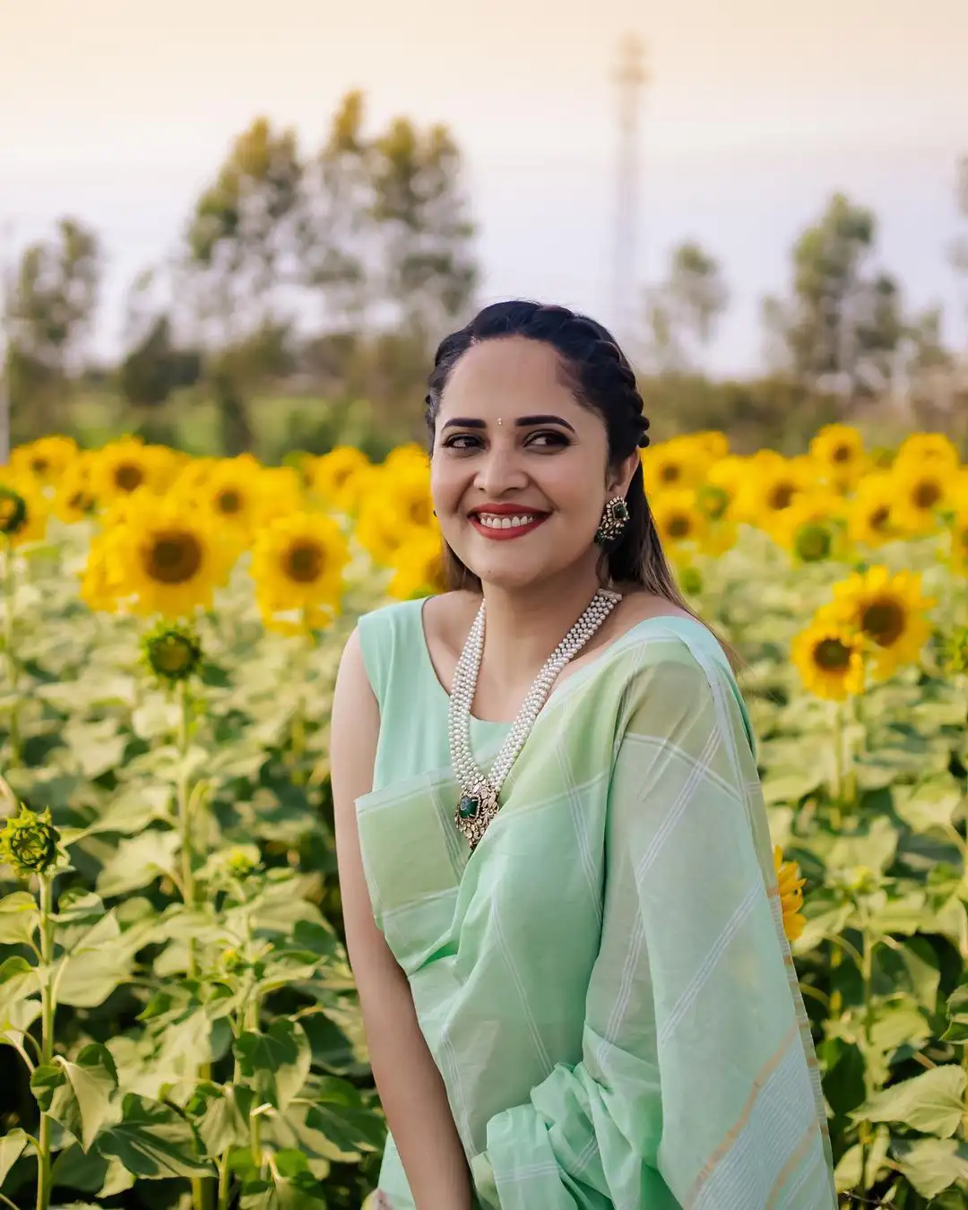 Anasuya enjoying in Sunflower Garden.. Source @Anasuya Instagram  