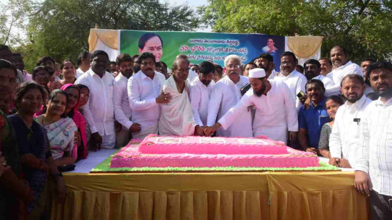 Minister Jagadishwar Reddy cutting the cake at CM KCR's birthday celebrations