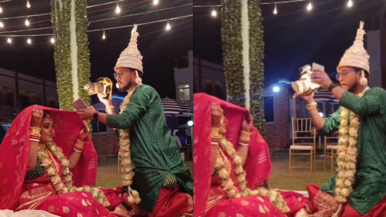 Groom As Photographer : తన పెళ్లికి తానే ఫోటోలు తీసుకున్న వరుడు .. వధువుని డిఫరెంట్ యాంగిల్స్లో క్లిక్ చేసి భలే వైరల్ అయ్యారుగా.. Groom As Photographer : తన పెళ్లికి తానే ఫోటోలు తీసుకున్న వరుడు .. వధువుని డిఫరెంట్ యాంగిల్స్లో క్లిక్ చేసి భలే వైరల్ అయ్యారుగా..