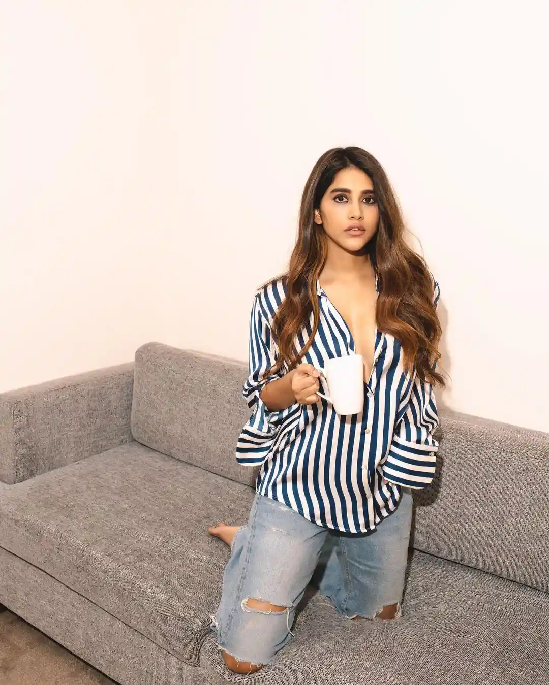 Nabha Natesh Stylish looks with coffee cup in Modern outfit  