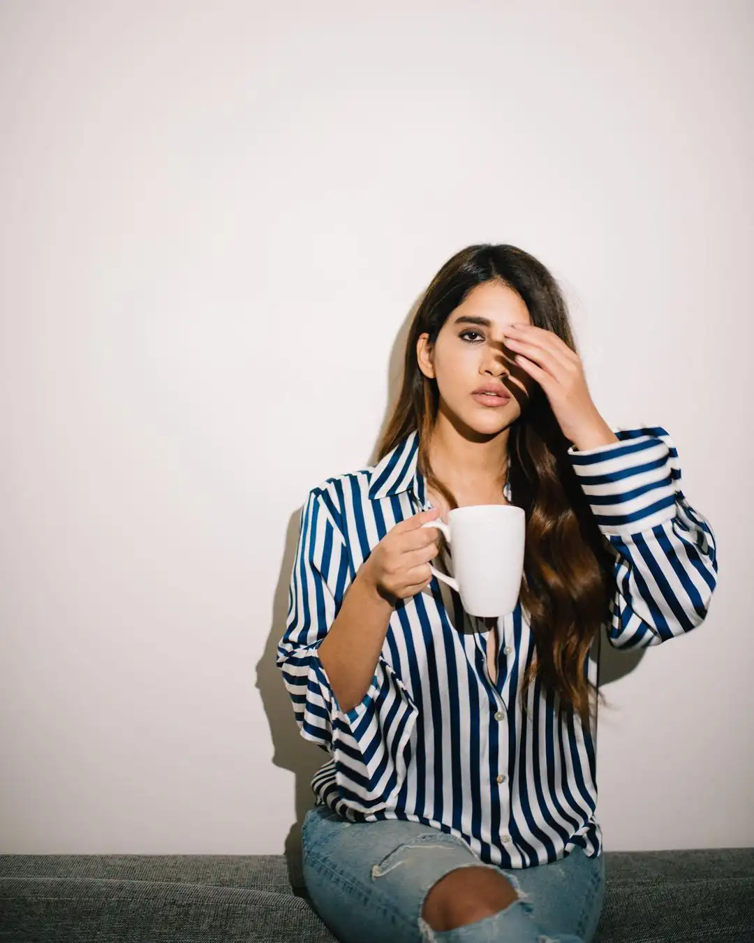 Nabha Natesh Stylish looks with coffee cup in Modern outfit  