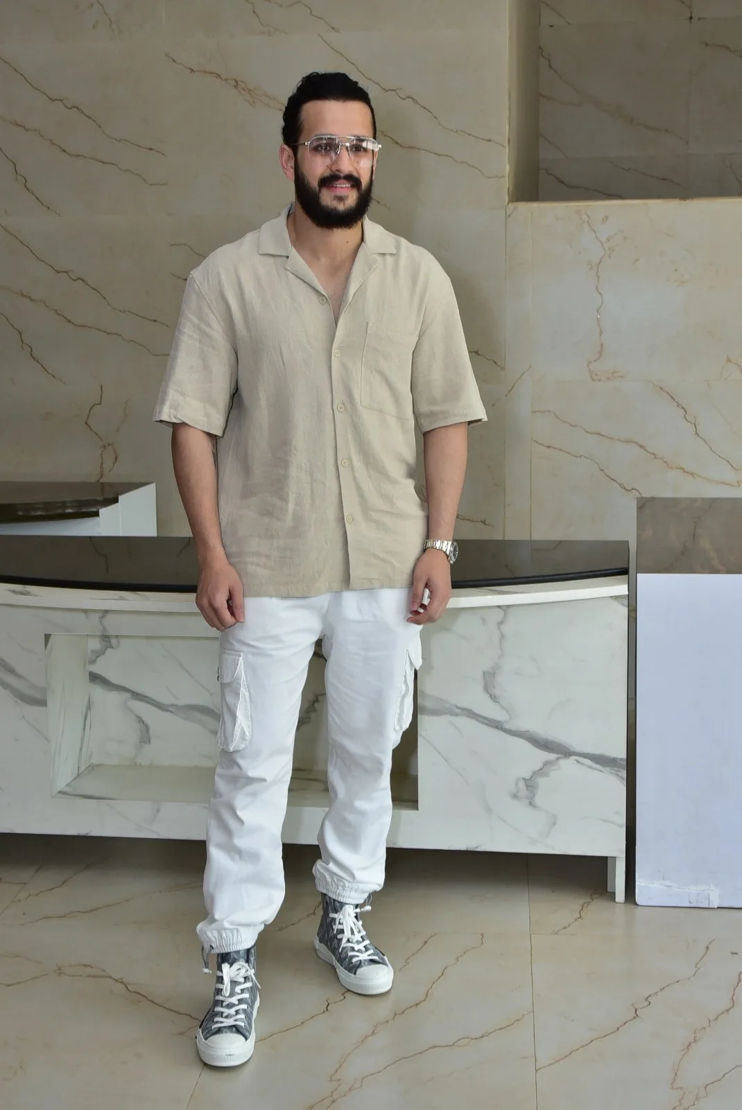 Akhil Akkineni stylish looks in agent movie promotions