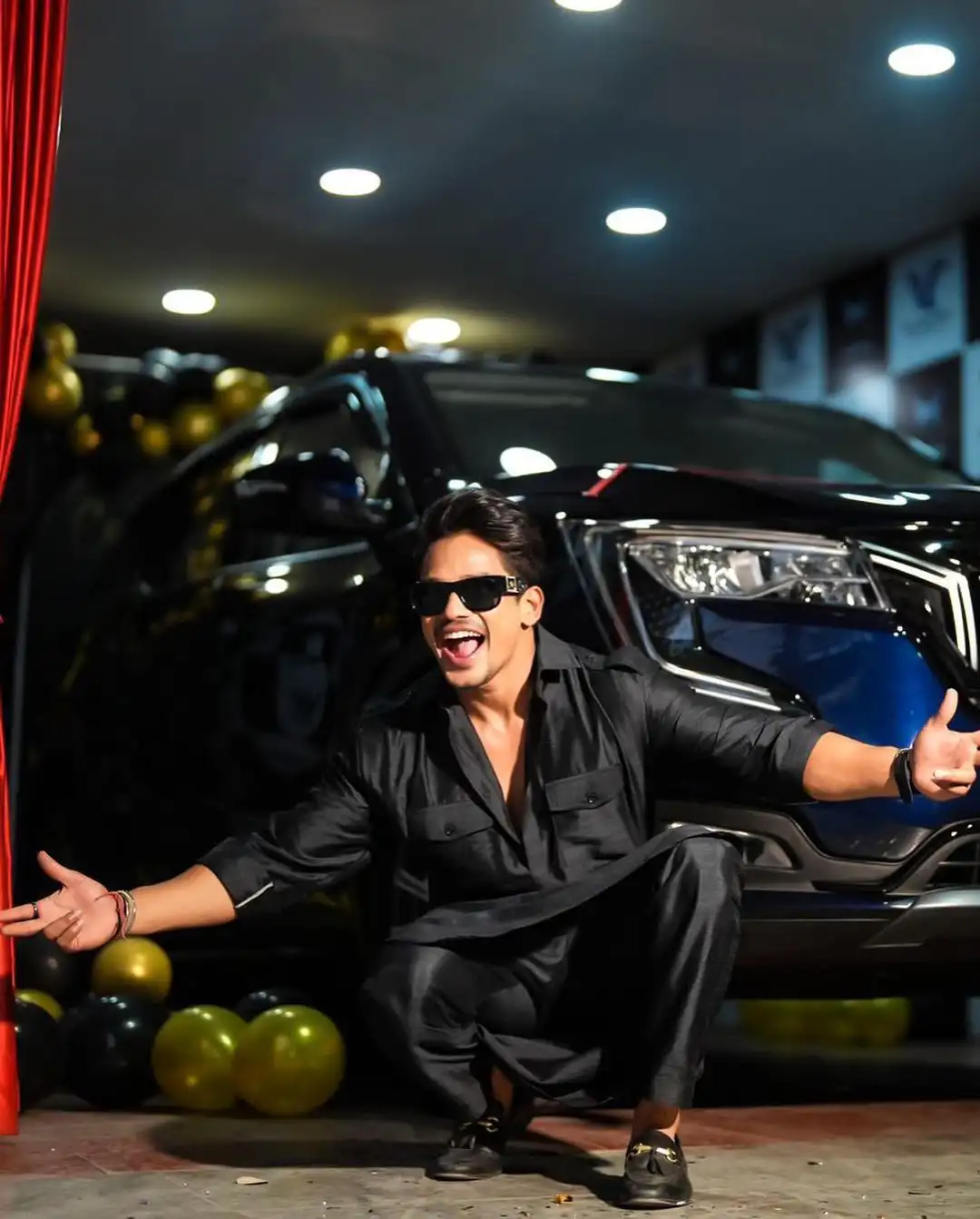 Mehaboob Dil Se poses with his new car