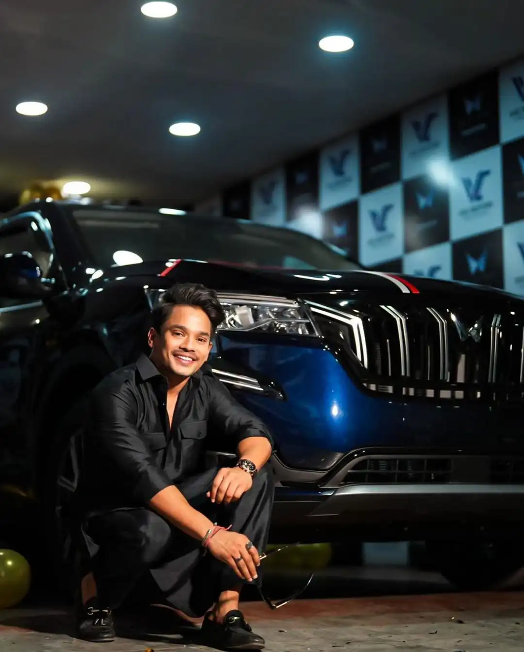Mehaboob Dil Se poses with his new car