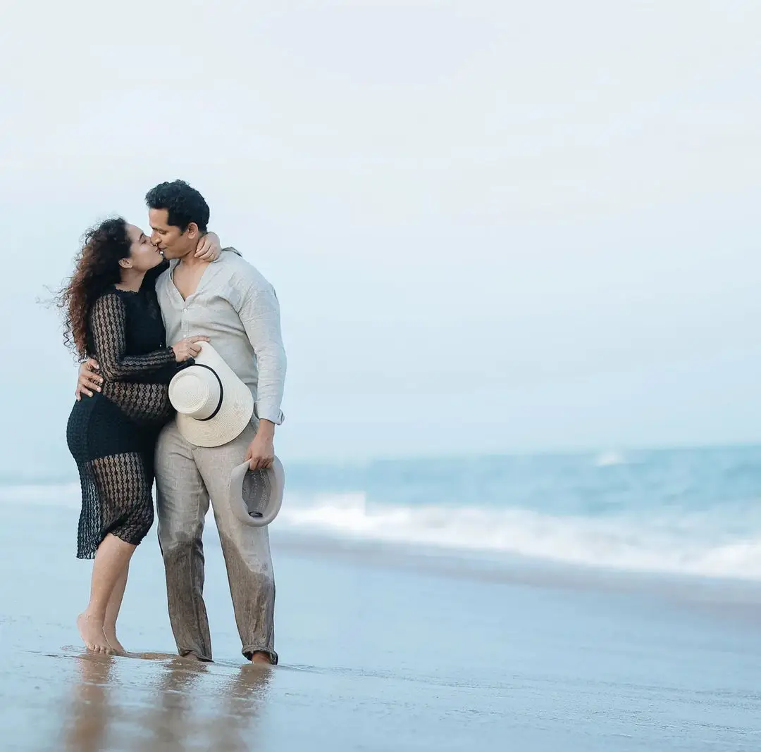 Actress Pooja Ramachandran Baby Bump Photo Shoot with Husband at Beach 