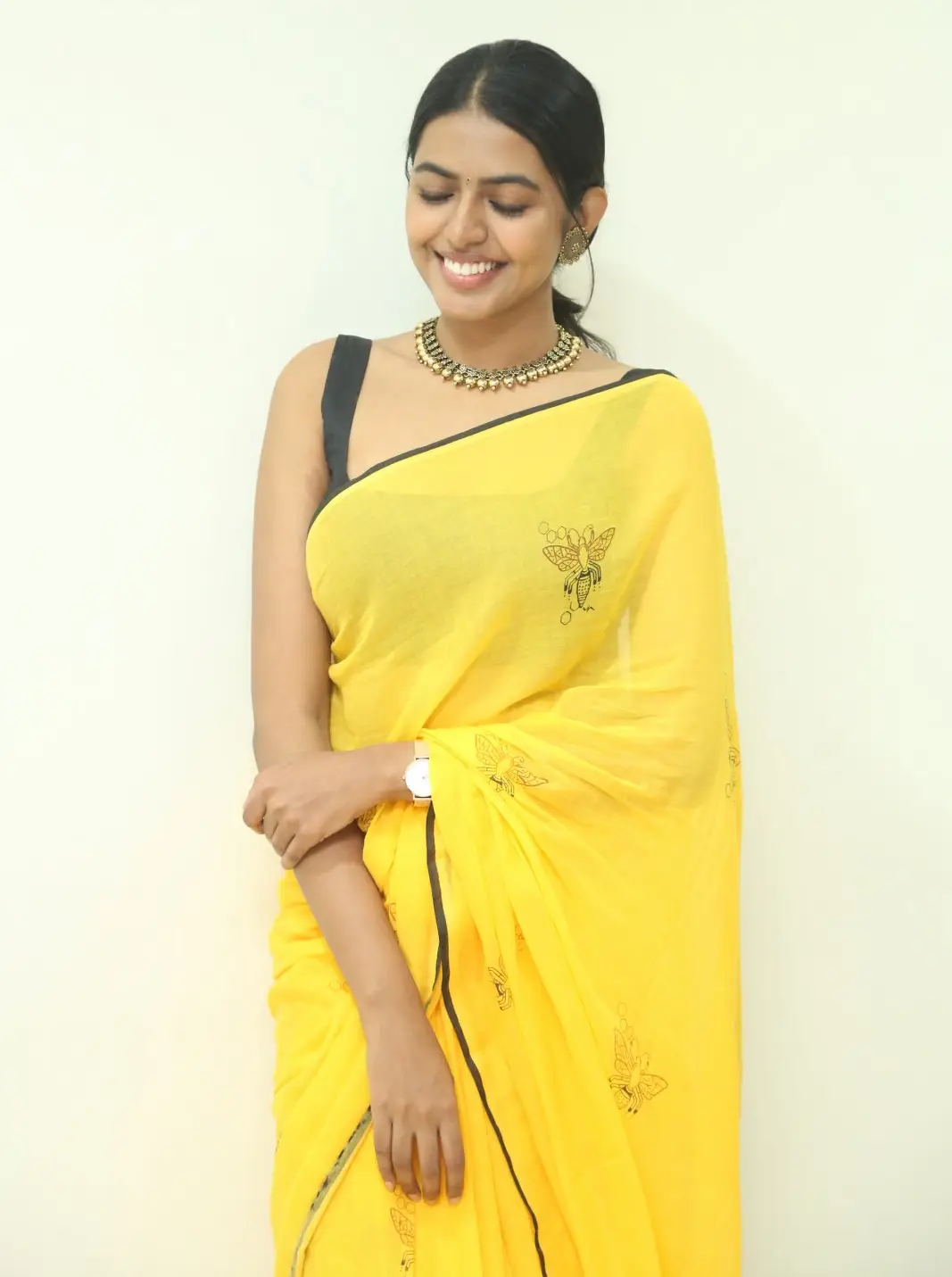 Shivani Rajashekar cute looks in Yellow Saree at Jilebi Movie Press meet