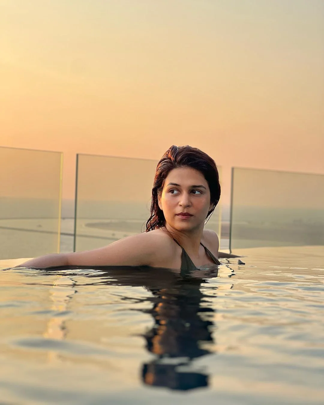 Shraddha Das Photoshoot in Swimming Dress