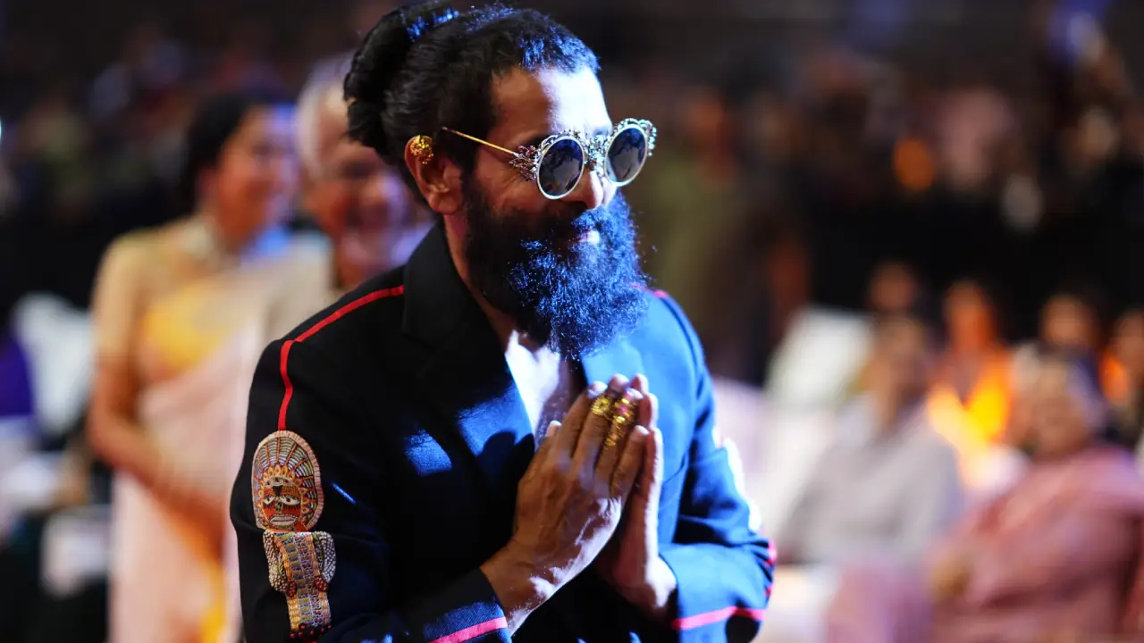 Vikram Stylish looks in Ponniyin Selvan 2 Pre Release Event at Hyderabad 