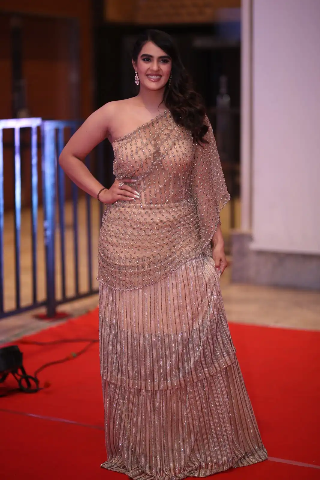 Kavya Thapar shines in different saree at Bichagadu 2 Pre Release Event