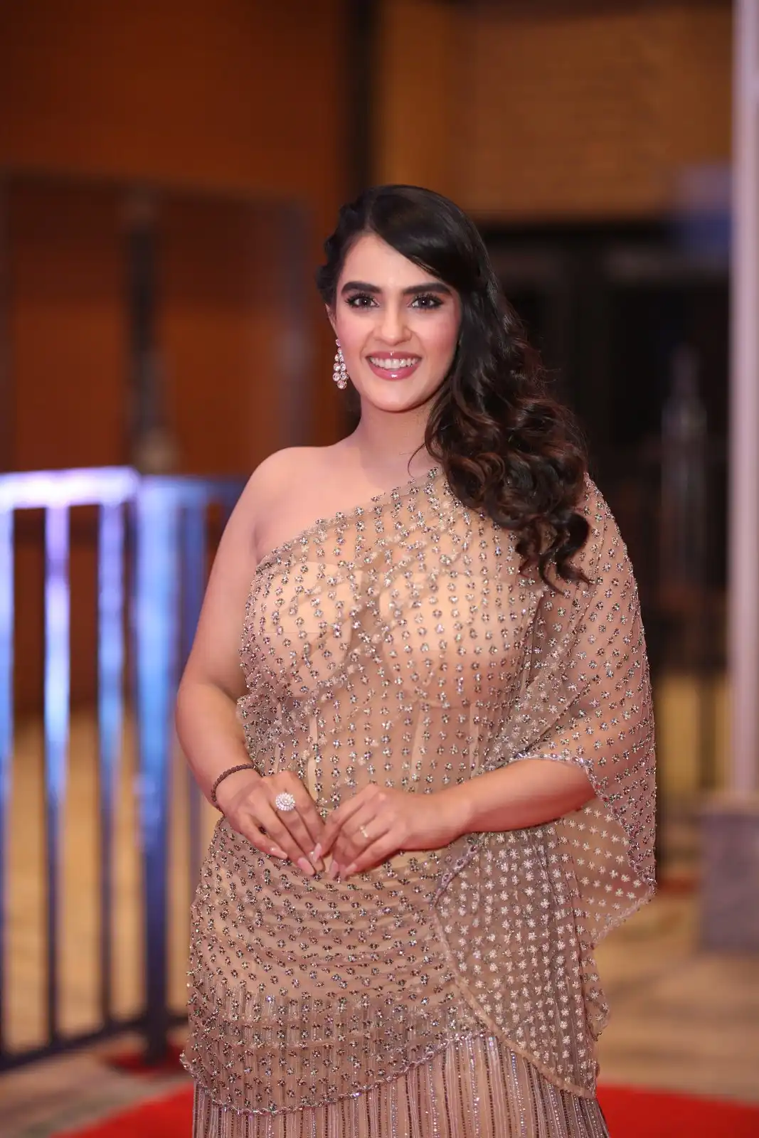 Kavya Thapar shines in different saree at Bichagadu 2 Pre Release Event