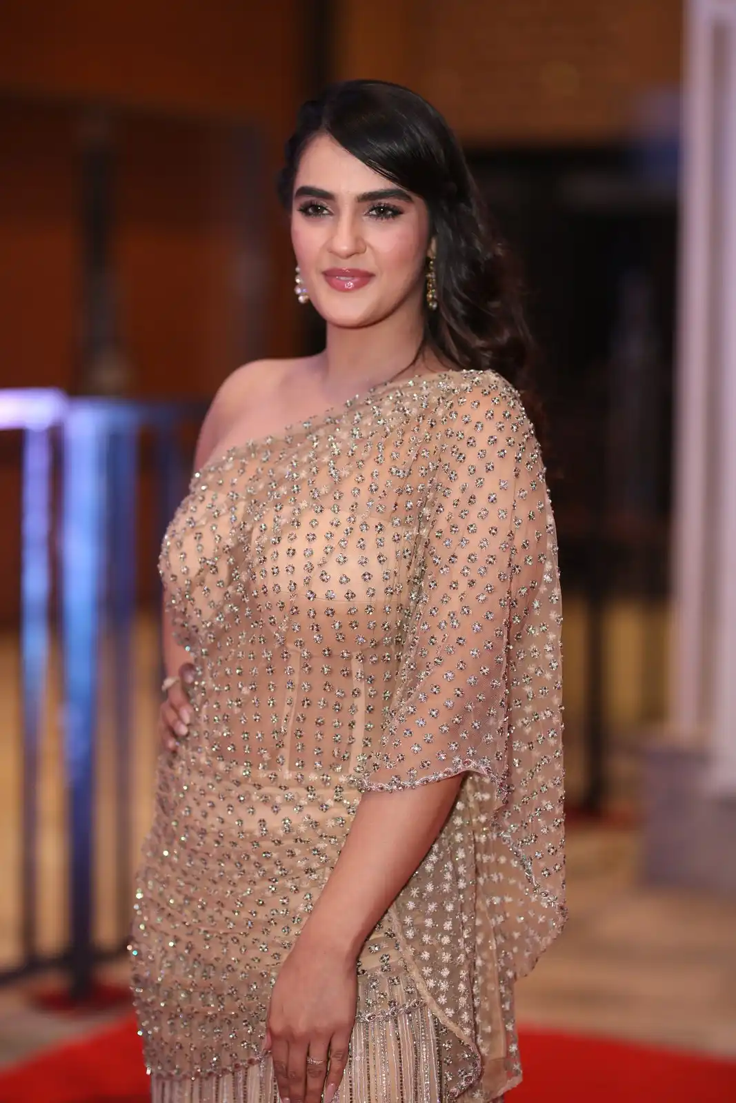 Kavya Thapar shines in different saree at Bichagadu 2 Pre Release Event