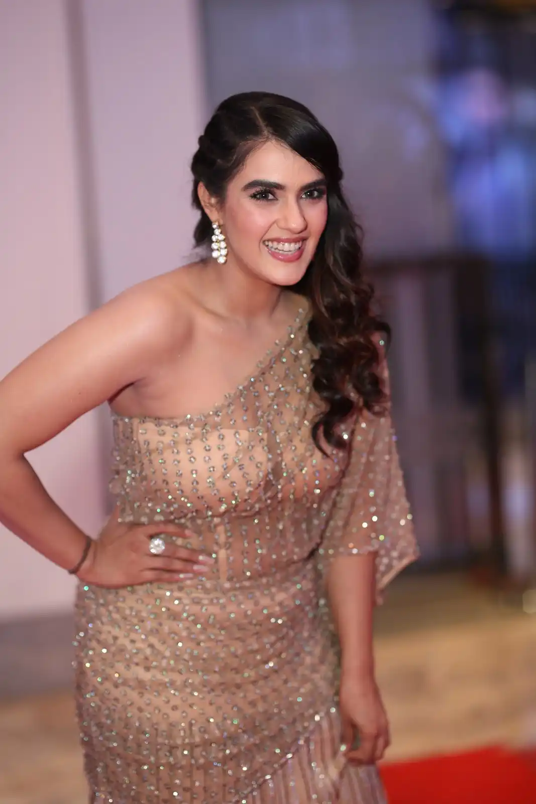 Kavya Thapar shines in different saree at Bichagadu 2 Pre Release Event