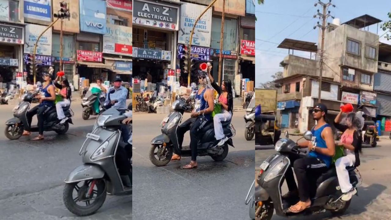 Maharashtra : పాపులారిటీ కోసం ఇంత బరితెగింపా? ట్రాఫిక్లో స్కూటర్పై స్నానం చేసిన జంట Maharashtra : పాపులారిటీ కోసం ఇంత బరితెగింపా? ట్రాఫిక్లో స్కూటర్పై స్నానం చేసిన జంట