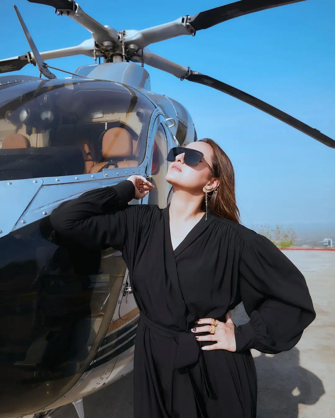 Sonakshi Sinha Stylish Poses with Helicopter 