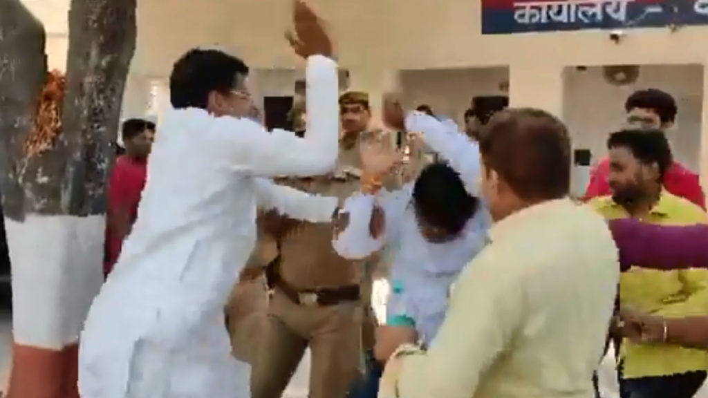 SP MLA Thrashes BJP Leader Husband In Police Station