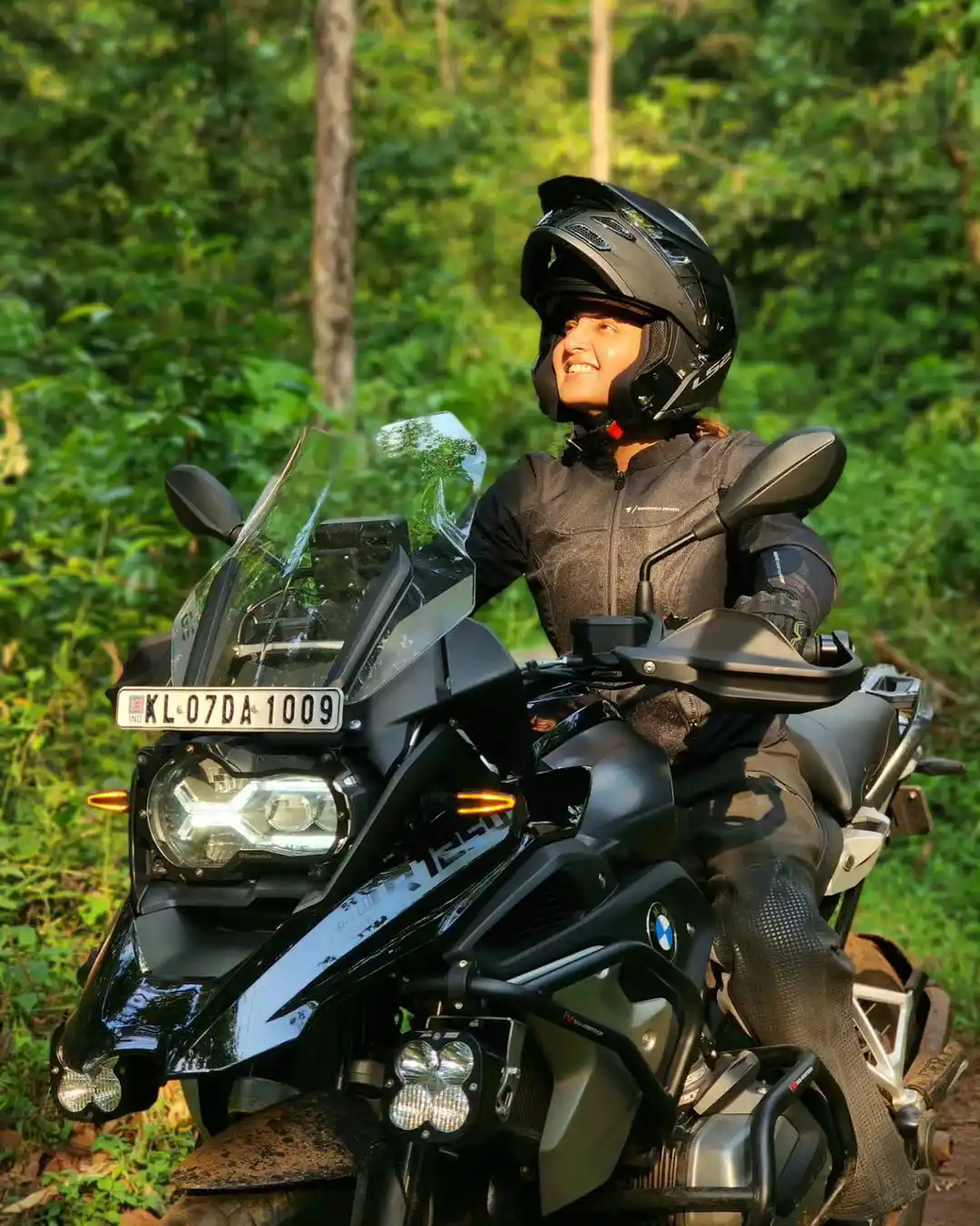 Malayala Actress Manju Warrier Bike Riding at Forest area photos