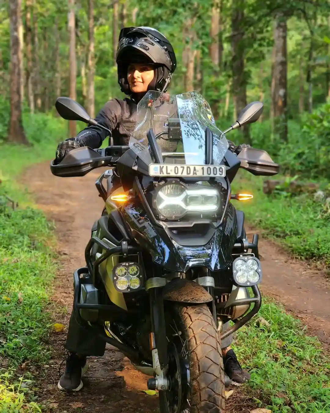 Malayala Actress Manju Warrier Bike Riding at Forest area photos
