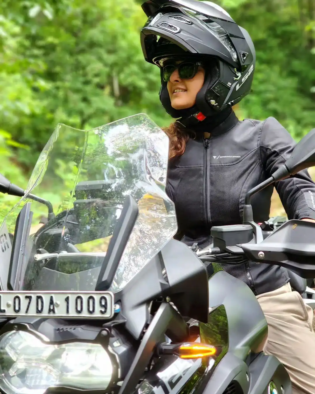 Malayala Actress Manju Warrier Bike Riding at Forest area photos
