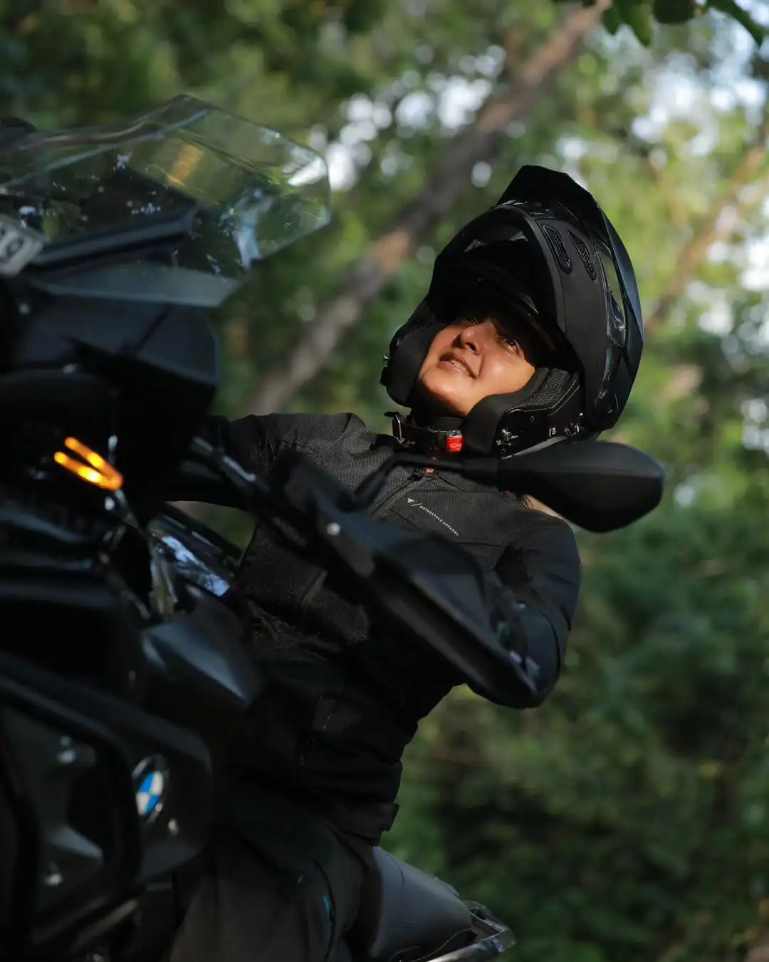 Malayala Actress Manju Warrier Bike Riding at Forest area photos