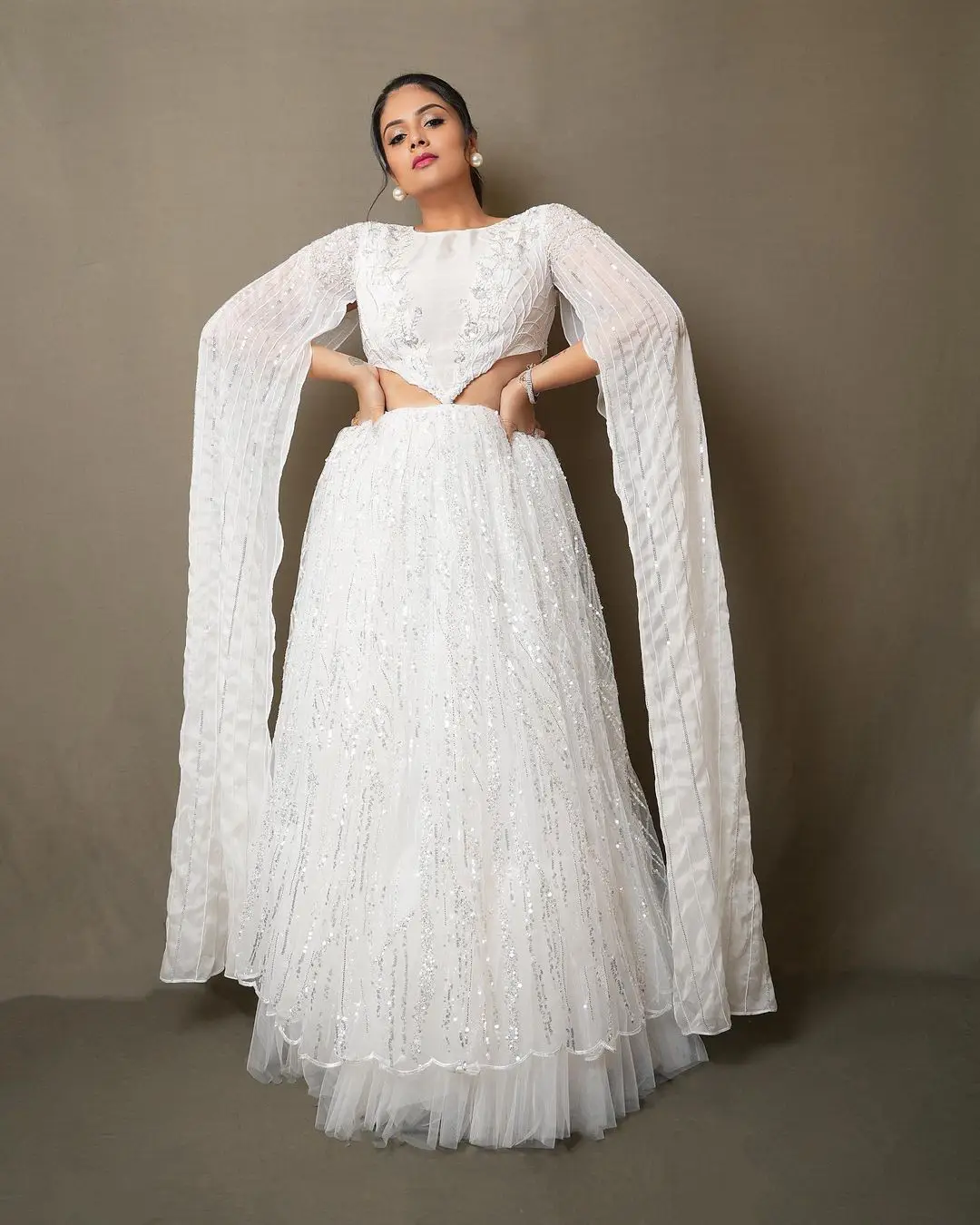 Sreemukhi Gorgeous looks in White Dress