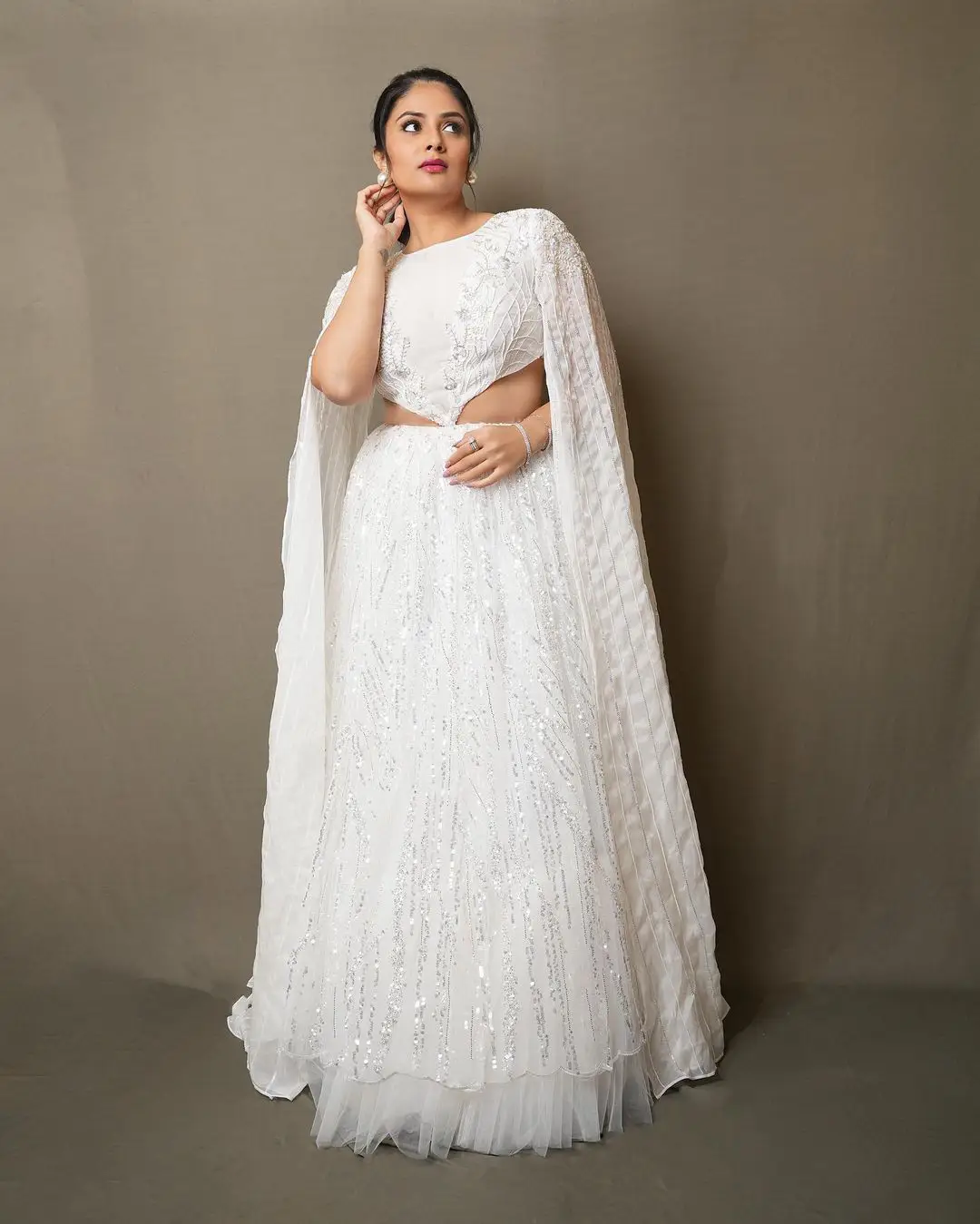 Sreemukhi Gorgeous looks in White Dress