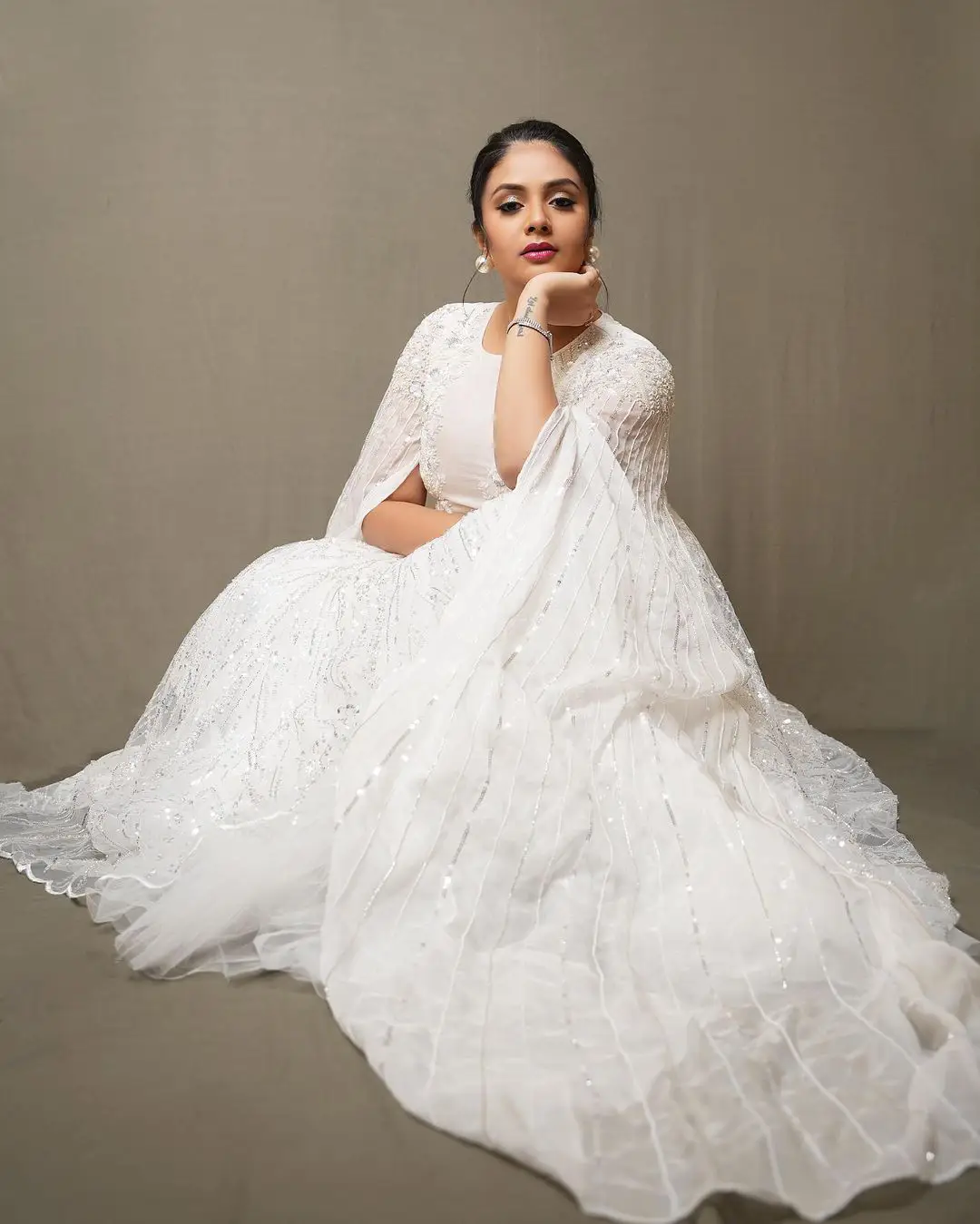 Sreemukhi Gorgeous looks in White Dress