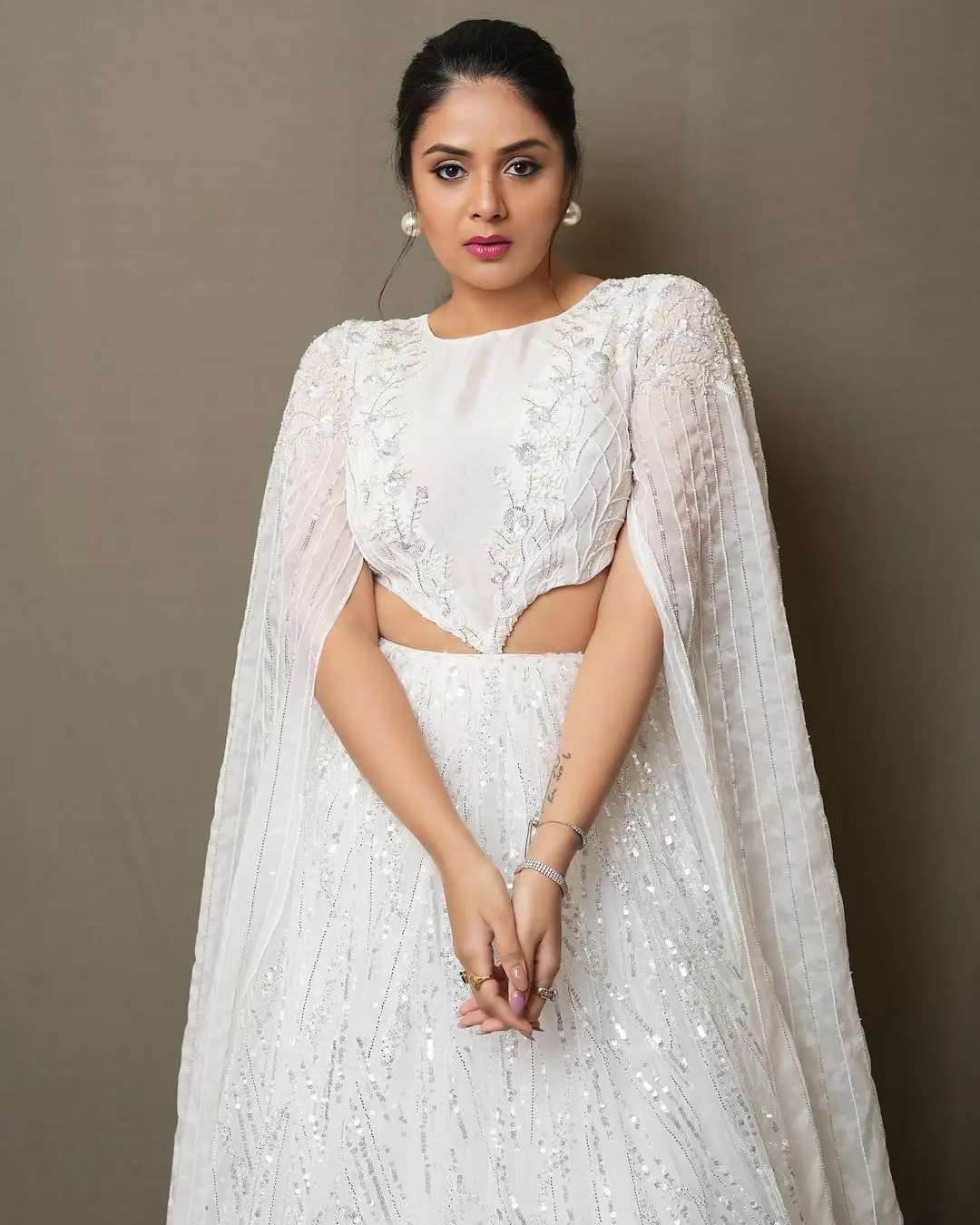 Sreemukhi Gorgeous looks in White Dress