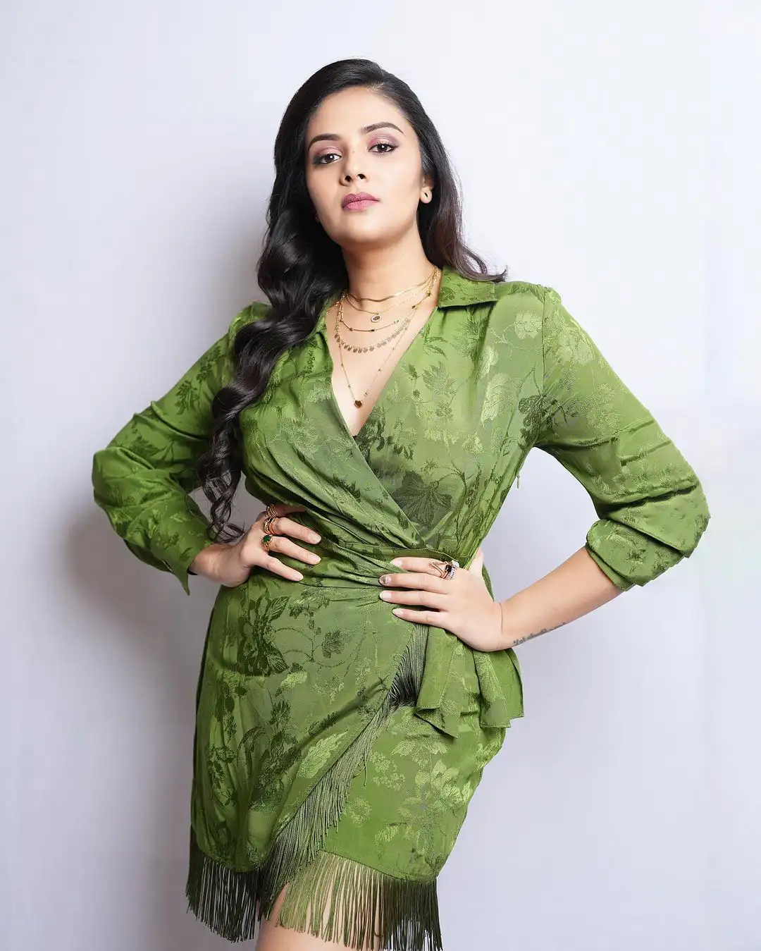Sreemukhi Latest Photo shoot in Short Green Dress