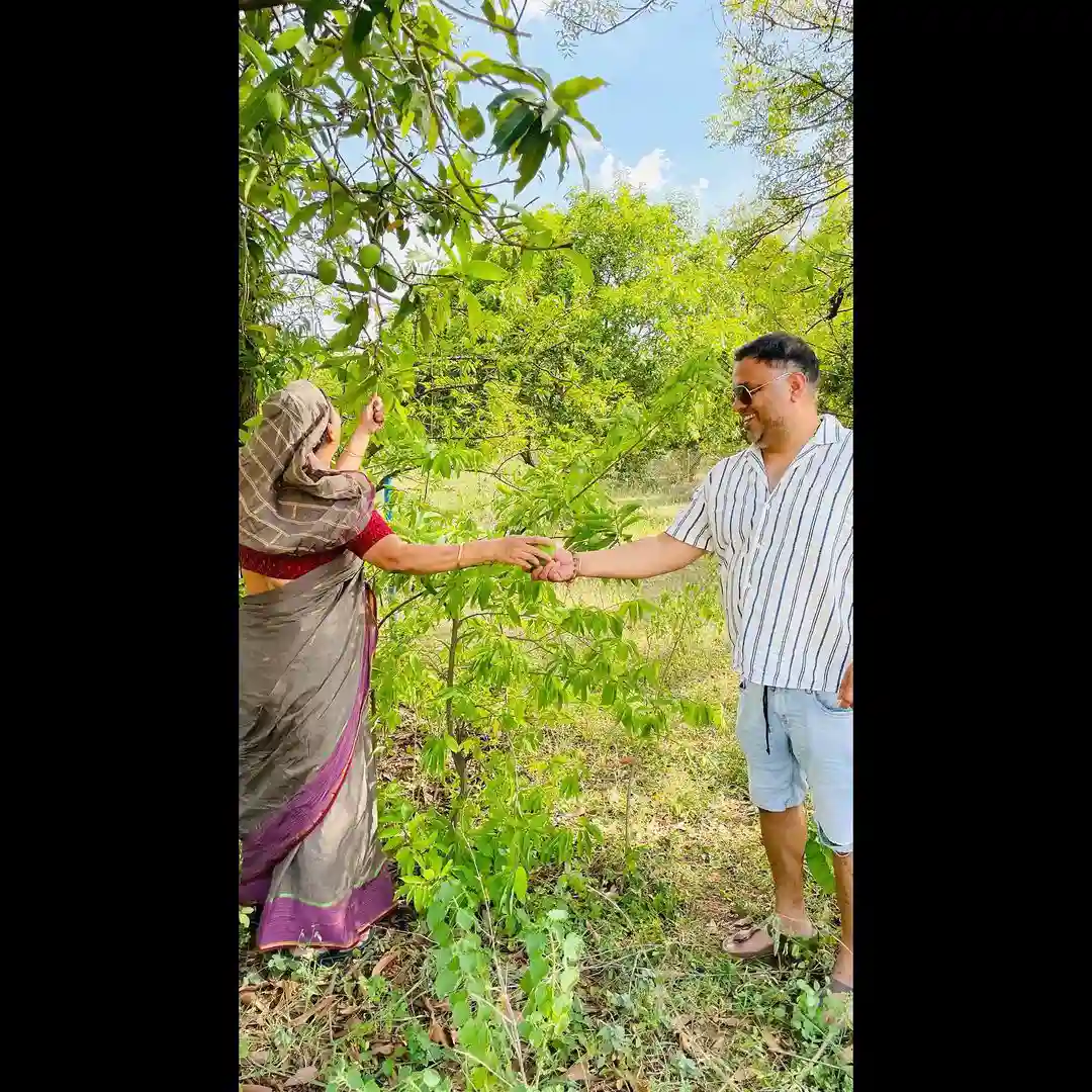 Tollywood Actress Anasuya enjoying at mango farm with her husband